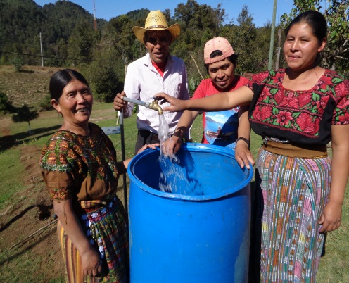 Families participating in a community water activity